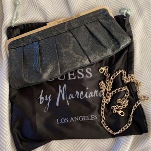Black Faux Snake/ Python Clutch Guess by Marciano